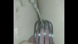 sissy pissing herself again with a new chastity